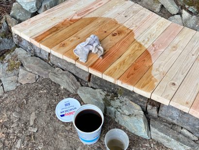 low bench made from rock and wood